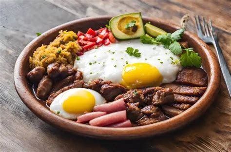  Bandeja Paisa: Indulge In A Symphony Of Savory Meats And Vibrant Tropical Flavors!