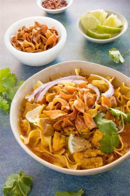 Khao Soi! A Flavorful Symphony of Spicy, Creamy Coconut Curry and Crunchy Fried Noodles